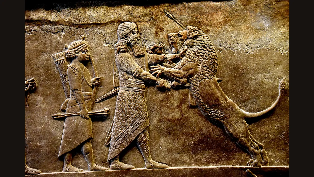 Ashurbanipal hunting lions, palace relief from Nineveh (British Museum, photograph via Wikimedia Commons)